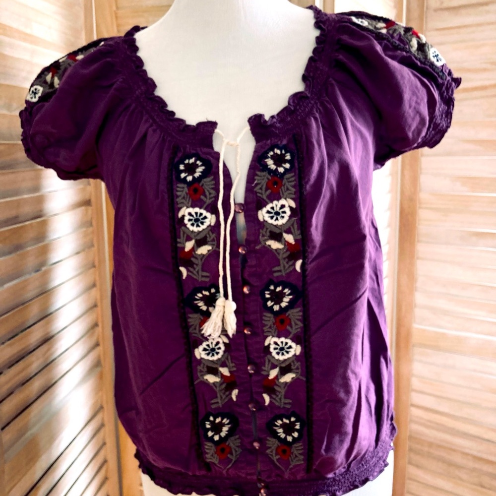 Embroidered blouse.